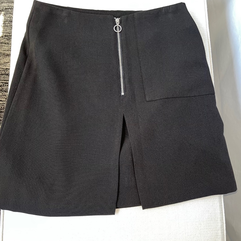 Twik (S) by Simons, A-line short skirt with zipper, front pleat, and pocket